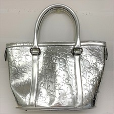 エコスタイル銀座本店にてクリスチャンディオールのトロッター柄のメタリックハンドバッグを買取致しました。状態は若干の使用感がある中古品です。