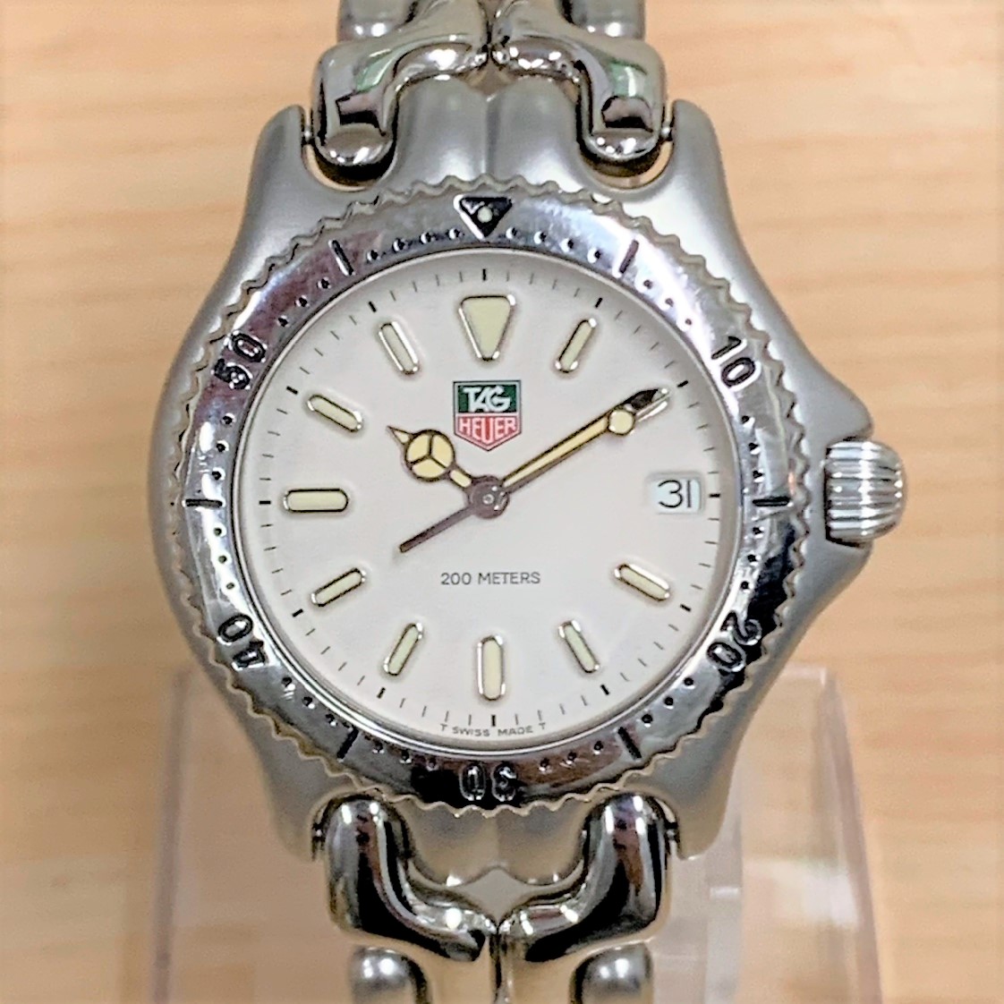 タグホイヤーのS99.013M 白文字盤 デイト クオーツ 腕時計の買取実績です。