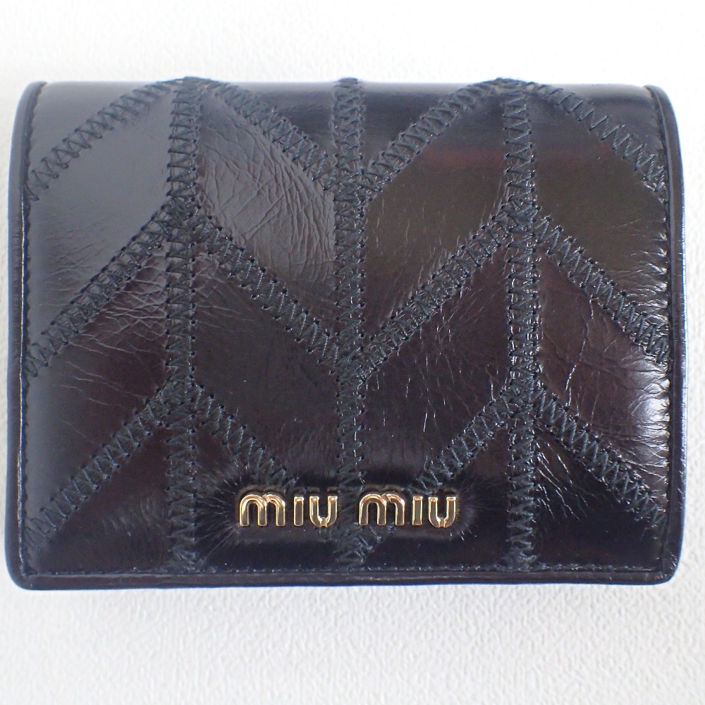 ミュウミュウの5MV204 VIT.SHINE PATCH　レザーパッチワーク　二つ折り財布(小銭入れあり)　NEROの買取実績です。
